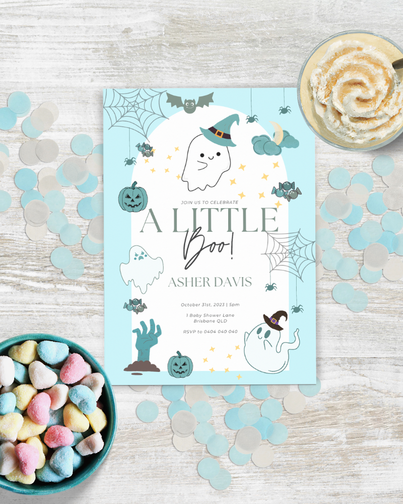 A festive invitation featuring playful ghosts, bats, and pumpkins on a light blue background with colorful heart-shaped treat