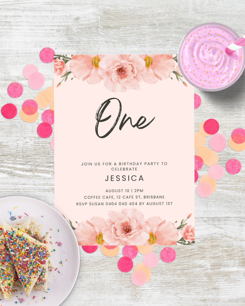 Birthday invitation featuring floral accents, colorful confetti, and a dessert with sprinkles on a wooden surface.