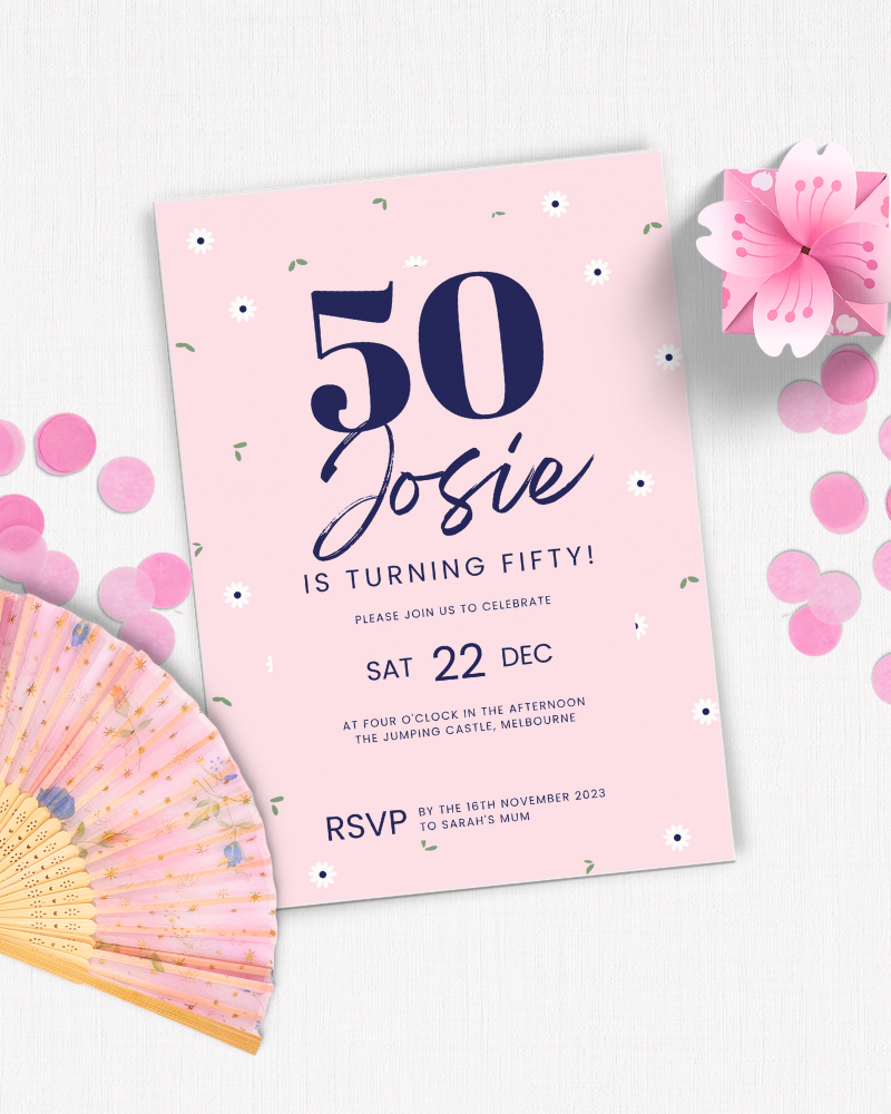 Pink invitation card for a 50th birthday celebration, surrounded by confetti and a decorative fan.