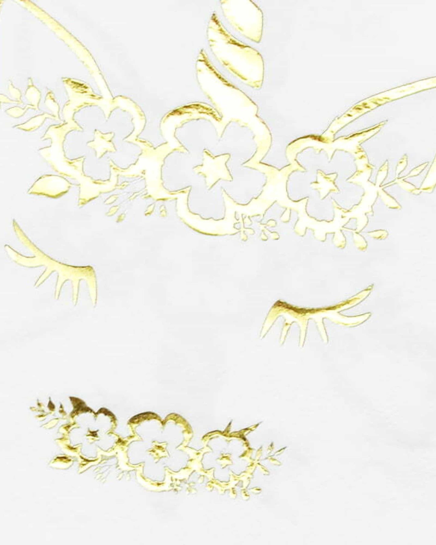 Gold floral illustrations with delicate leaves and stylized eyelashes on a white background.