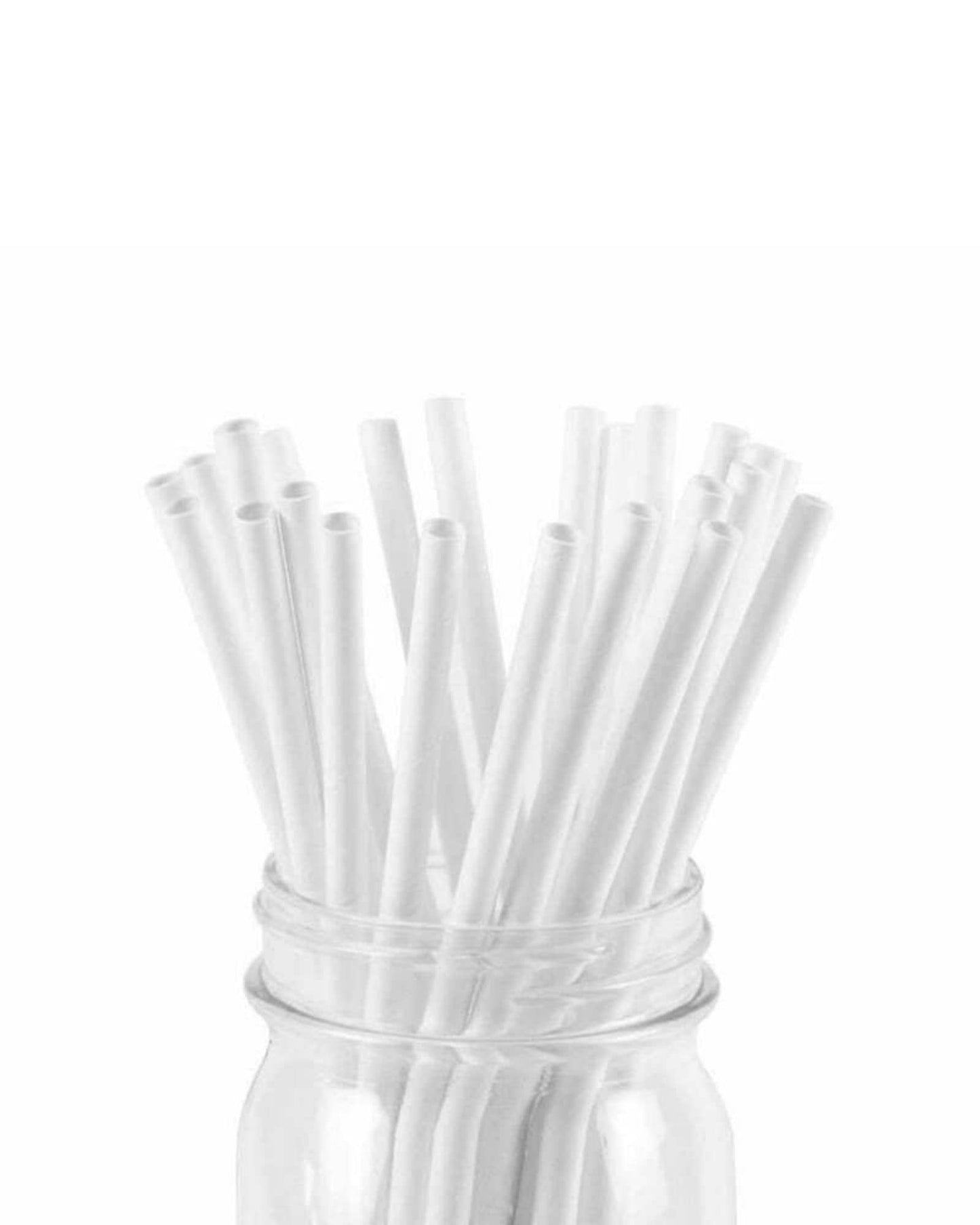 A clear jar filled with numerous straight white tubes standing upright against a white background.
