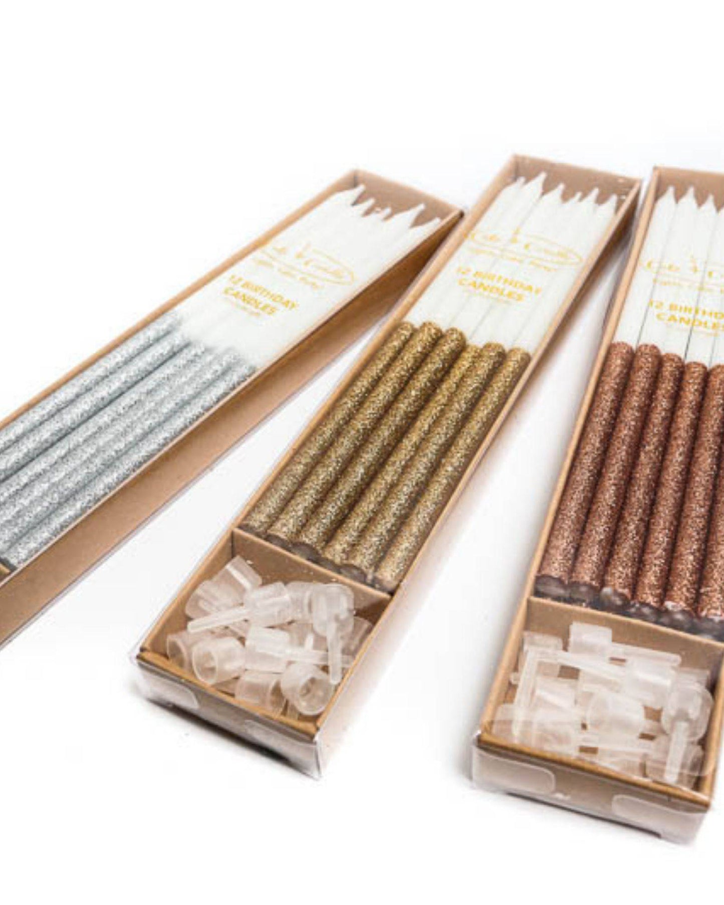 Three packs of glitter-dipped tall candles in silver, gold, and copper, with clear holders for easy placement.