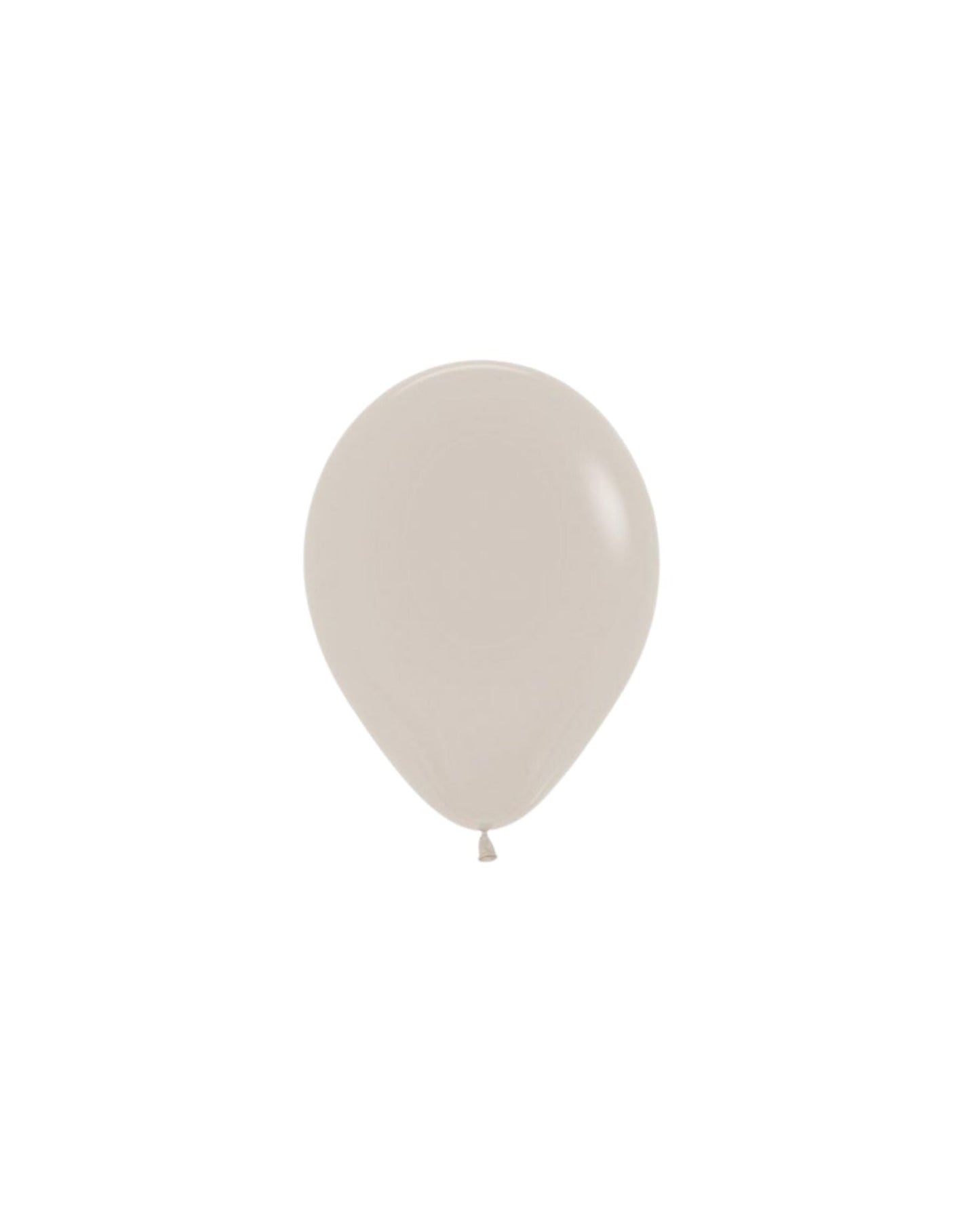 A smooth, light beige balloon with a rounded shape and a tied end, set against a plain white background.
