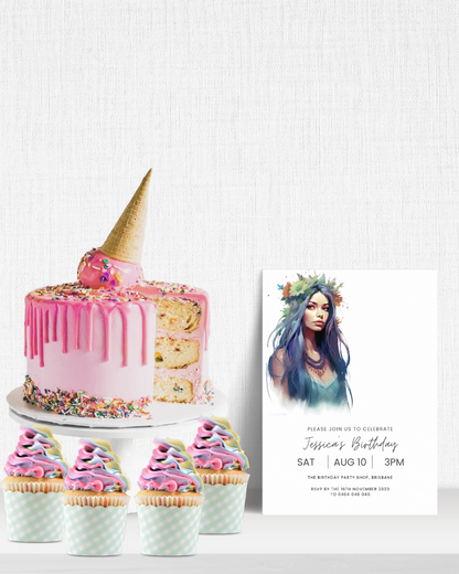 Colorful birthday cake with a cone on top, surrounded by pastel cupcakes and a festive invitation featuring a portrait.