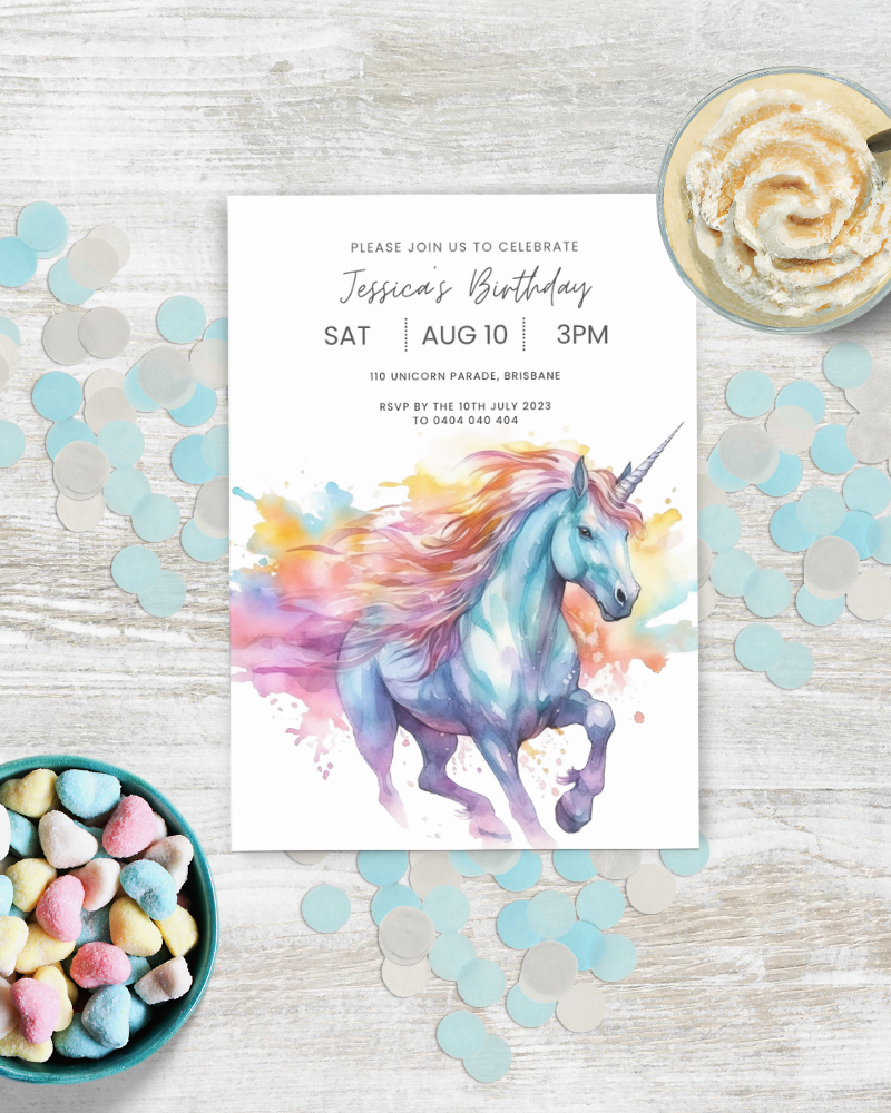 Colorful unicorn illustration with a birthday invitation, surrounded by pastel confetti and heart-shaped sweets.