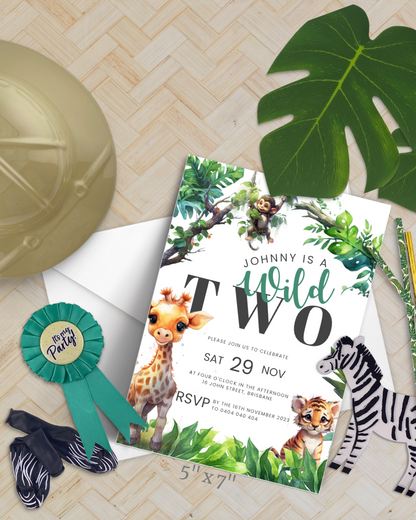 Colorful birthday invitation featuring a giraffe, tiger, and monkey surrounded by tropical leaves.