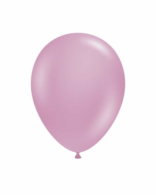 Single pastel pink balloon floating against a clean white background, showcasing its smooth, glossy surface.