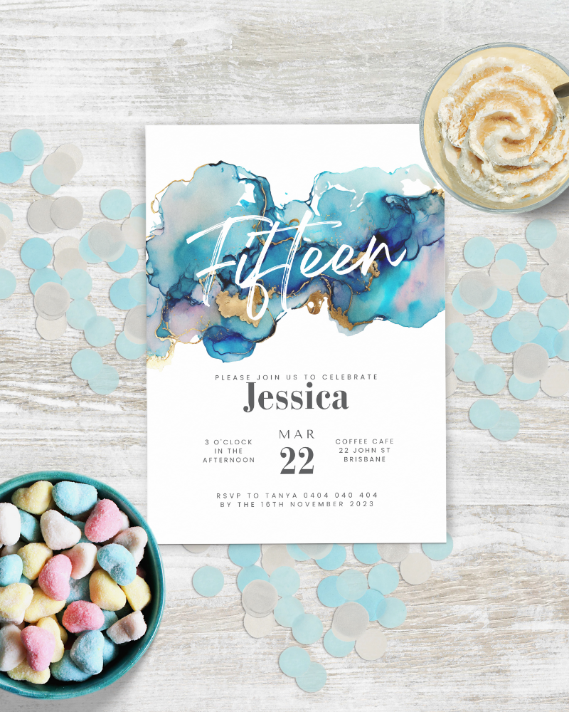 Invitation featuring elegant blue and gold watercolor accents, surrounded by colorful heart-shaped candies and confetti.