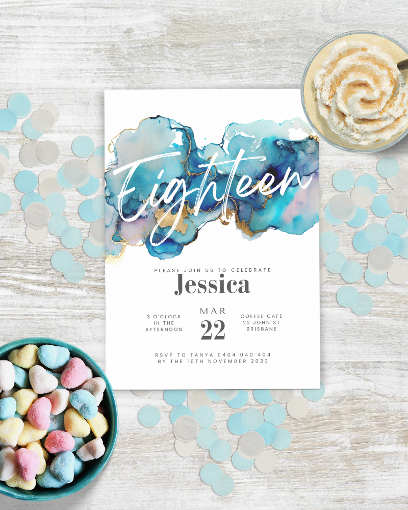 A vibrant invitation featuring aqua and gold watercolor swirls, surrounded by pastel confetti and heart-shaped sweets.