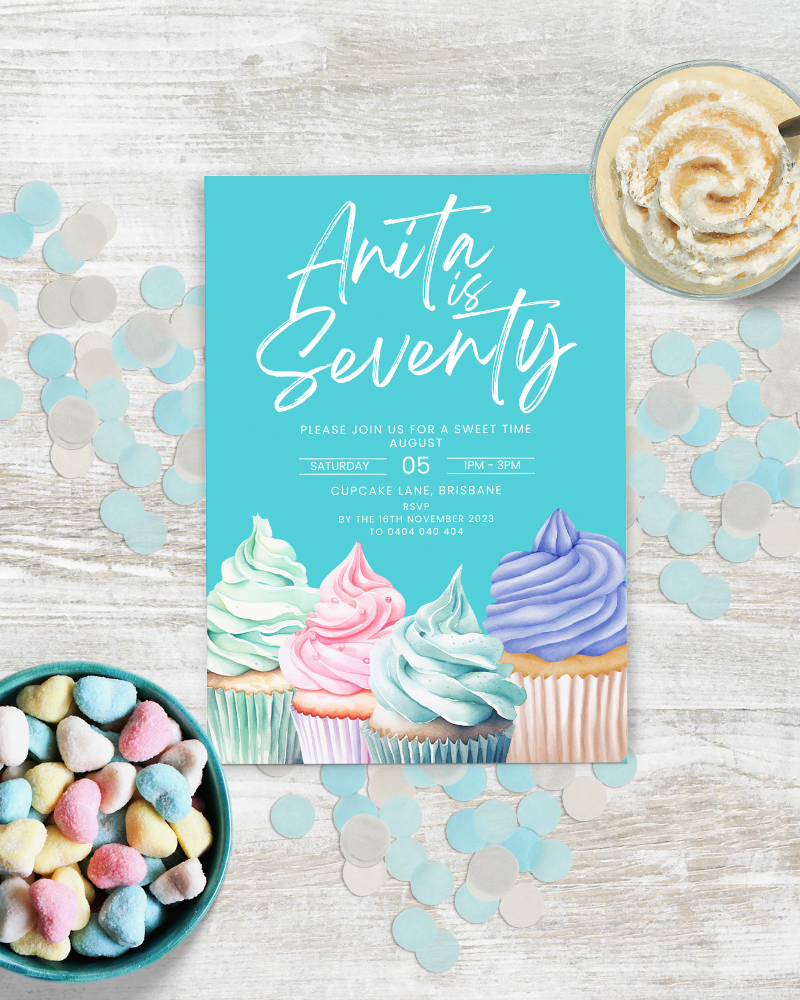 Invitation for a birthday celebration with colorful frosting, confetti, and heart-shaped candies on a wooden surface.