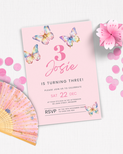 A pink birthday invitation with butterflies, floral fan, and confetti, celebrating a third birthday for Josie.