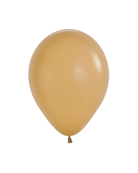 Single, glossy, golden balloon captured against a white background, showcasing a smooth and rounded shape.