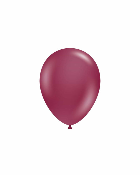 A glossy, deep burgundy balloon floats against a clean white background, showcasing its smooth surface.