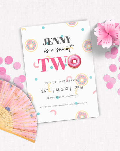 Colorful invitation featuring playful donut graphics and a pink flower, celebrating a second birthday party.