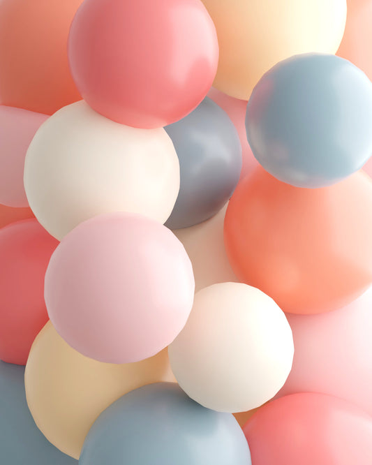 A colorful assortment of glossy spheres in soft pastel shades, creating a playful and inviting atmosphere.