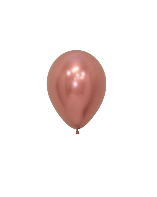 Shiny rose gold balloon with a smooth surface, reflecting light, isolated on a white background.