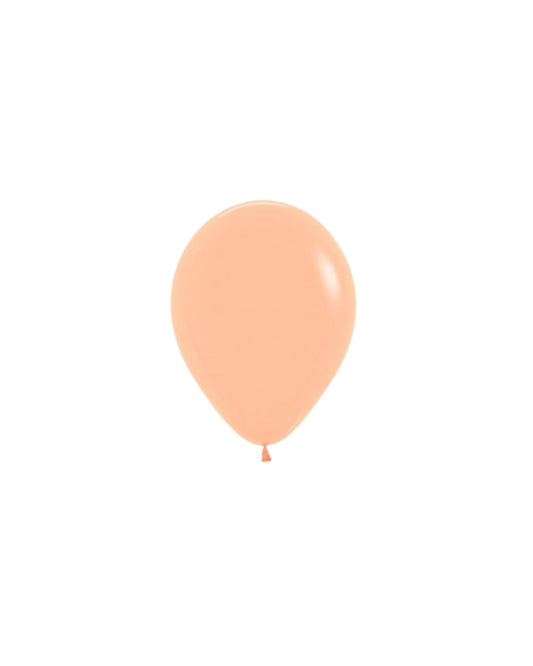 Peach blush mini balloon, smooth surface, rounded shape, hanging from a small tied end against a white background.