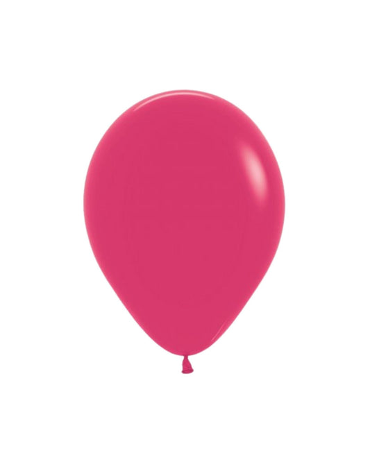 Bright pink balloon with a smooth, shiny surface, elegantly hanging from a small knot at the bottom against a white backgroun