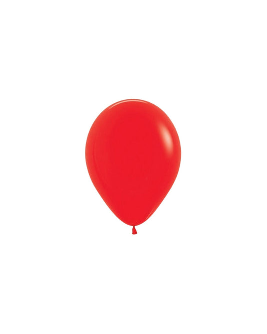 Bright red balloon with a glossy finish, hanging against a plain white background.