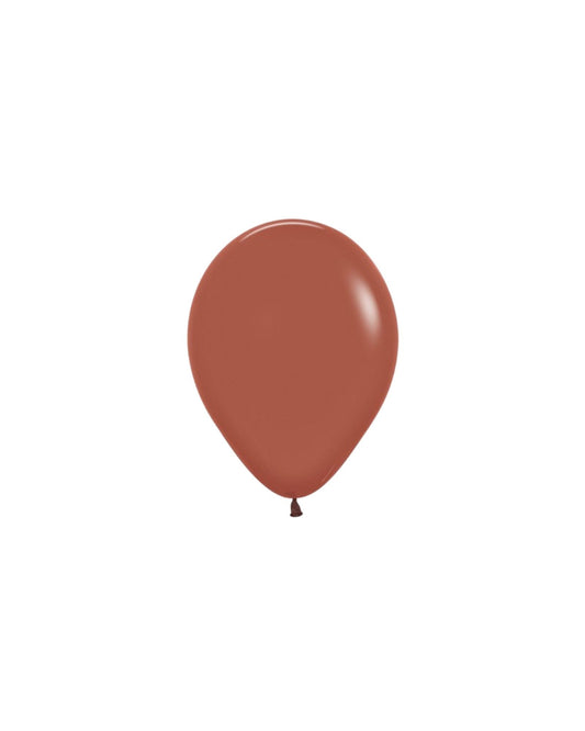 A glossy, terracotta-colored balloon with a rounded shape, set against a plain white background.