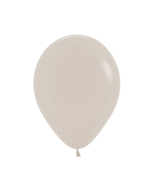 A smooth, cream-colored balloon with a rounded shape and a small twisted tail at the bottom.