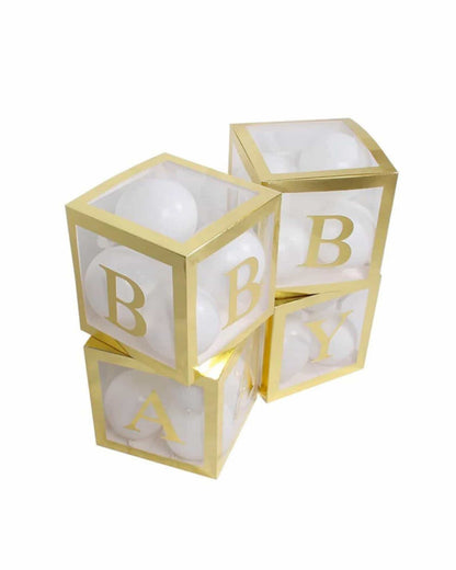 Four clear cubes with gold accents displaying the letters A, B, and Y, filled with white spherical shapes.