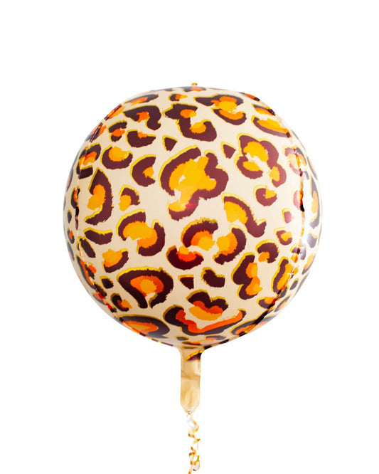 A round balloon featuring a vibrant leopard print pattern in shades of orange and brown.