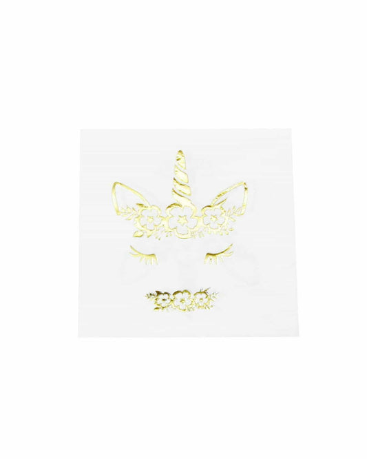 Gold unicorn face with floral accents and eyelashes on a white background. Playful and whimsical aesthetic.