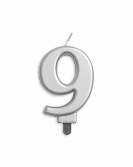 A shiny silver numeral "9" candle with a thin wick, designed for celebratory occasions.