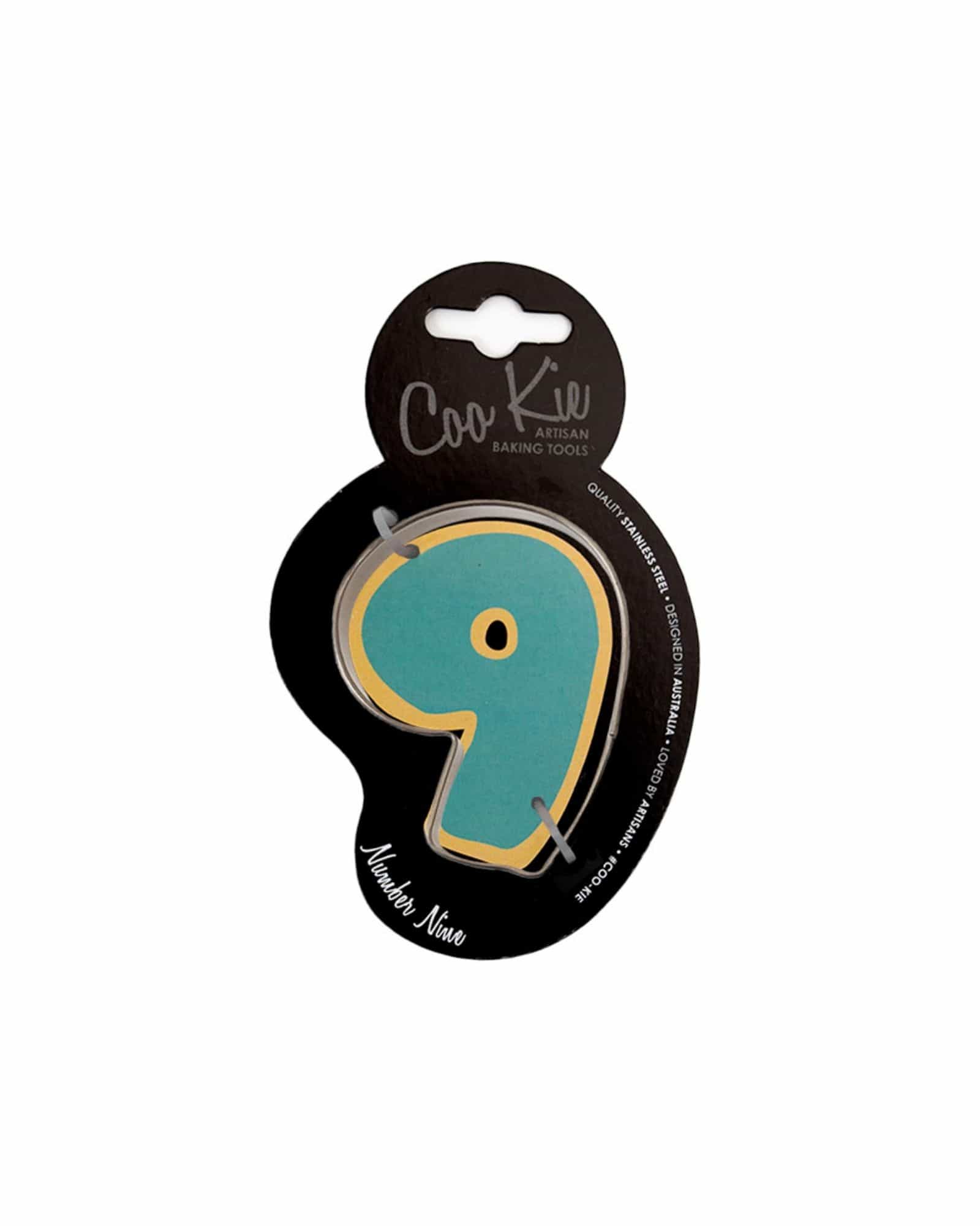 Colorful number nine in turquoise with a gold outline, displayed on a black backing with a hanging hole.