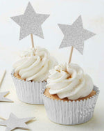 Silver Star Shaped Cupcake Picks atop cupcake in silver foil patty pan
