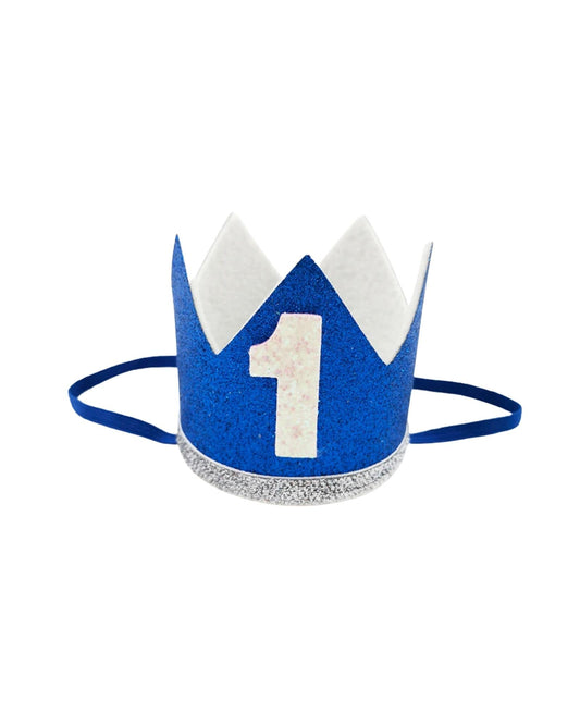 A blue crown with a glittery silver band and a large white number one, perfect for celebrating special occasions.