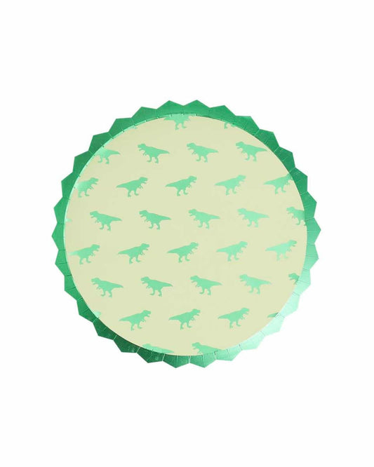 Round, mint green surface featuring playful dinosaur silhouettes, framed with a shiny green scalloped edge.