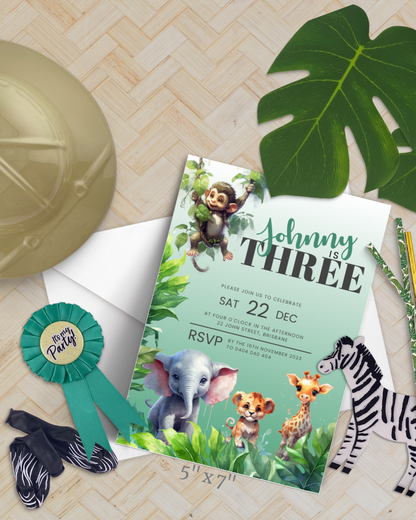 A colorful invitation featuring a monkey, elephant, and lion cub among lush greenery with a festive theme.