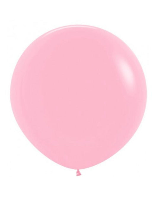 A large, glossy pink balloon against a plain background, exuding a cheerful and festive vibe.