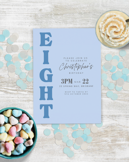 Blue invitation featuring large "EIGHT," surrounded by colorful confetti and a bowl of heart-shaped candies.