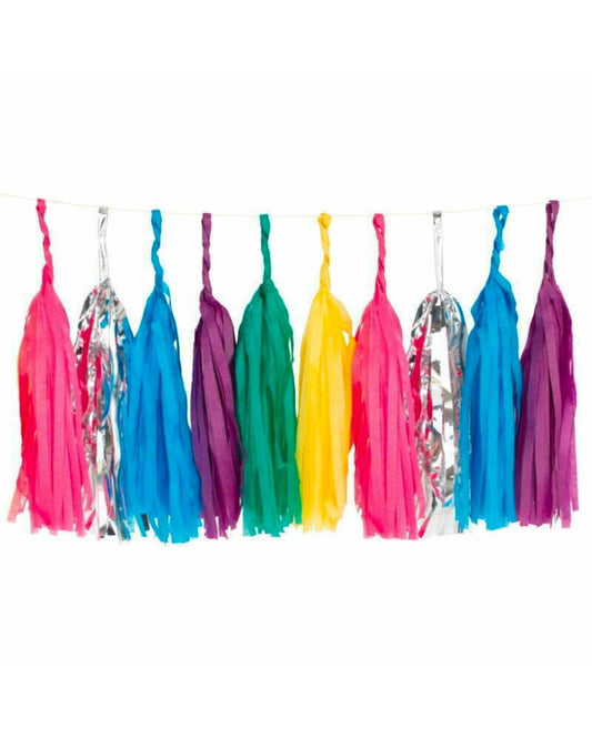 Colorful streamers in pink, blue, green, purple, yellow, and shiny silver hanging in a festive arrangement.