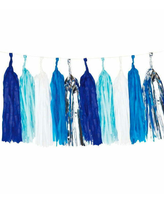 Colorful tassels in shades of blue and white, hanging from a string, creating a festive and vibrant display.