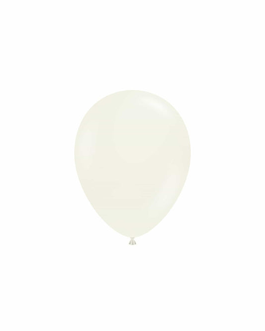 A smooth, pale balloon floats against a white background, featuring a subtle sheen and a tapered end.