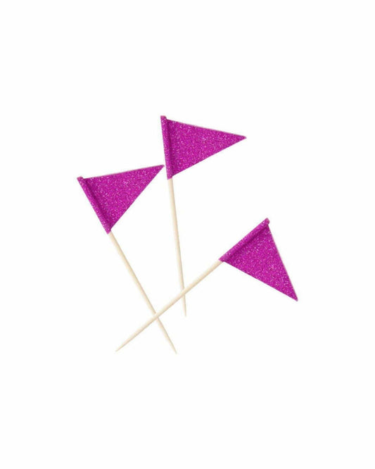 Three glittery purple flags on wooden sticks, standing upright against a plain white background.