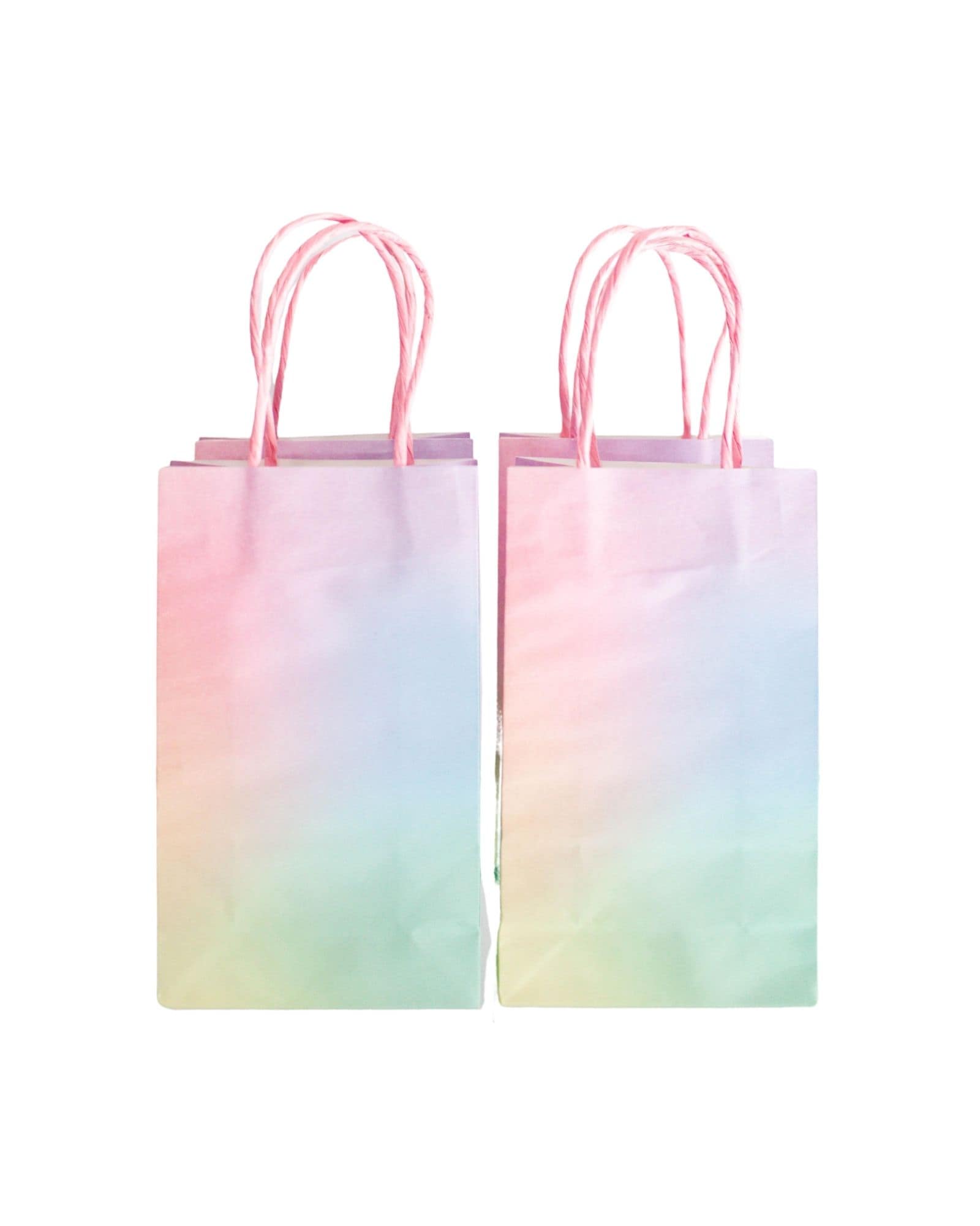 Two pastel gradient bags in pink and blue, featuring pink twisted handles, set against a white background.