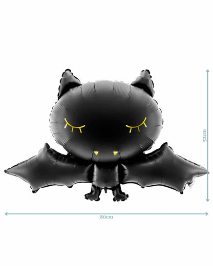 Black bat-shaped balloon with yellow accents, measuring 80cm wide and 52cm tall, features a playful expression.