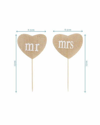 Heart-shaped toppers in burlap with "mr" and "mrs" in white, measuring 8.5cm wide and 17cm tall.