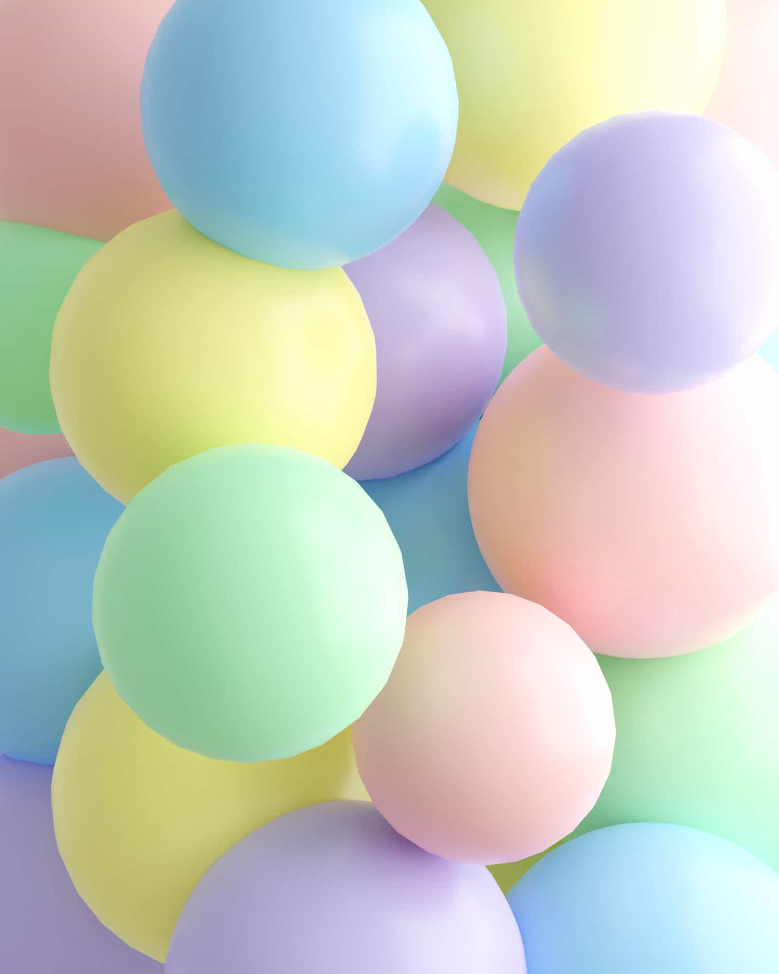 A colorful arrangement of pastel balloons in soft hues of blue, pink, yellow, green, and lavender.