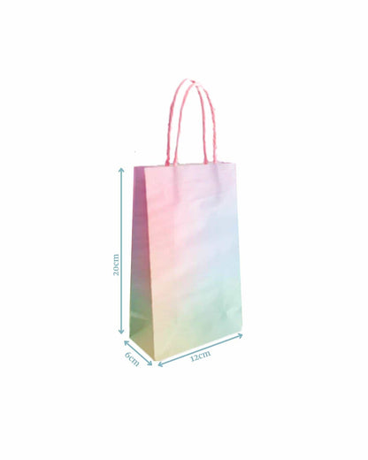 Pastel ombre gift bag with handles, featuring a gradient from pink to blue, measuring 20cm tall and 12cm wide.