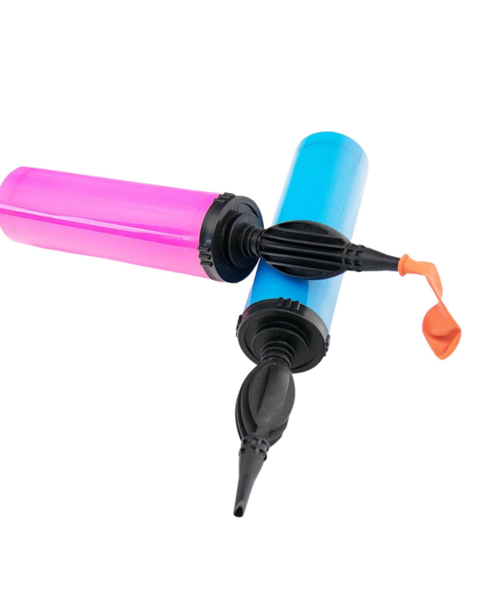 A pink and blue manual pump with black nozzles, one nozzle inflating an orange balloon.