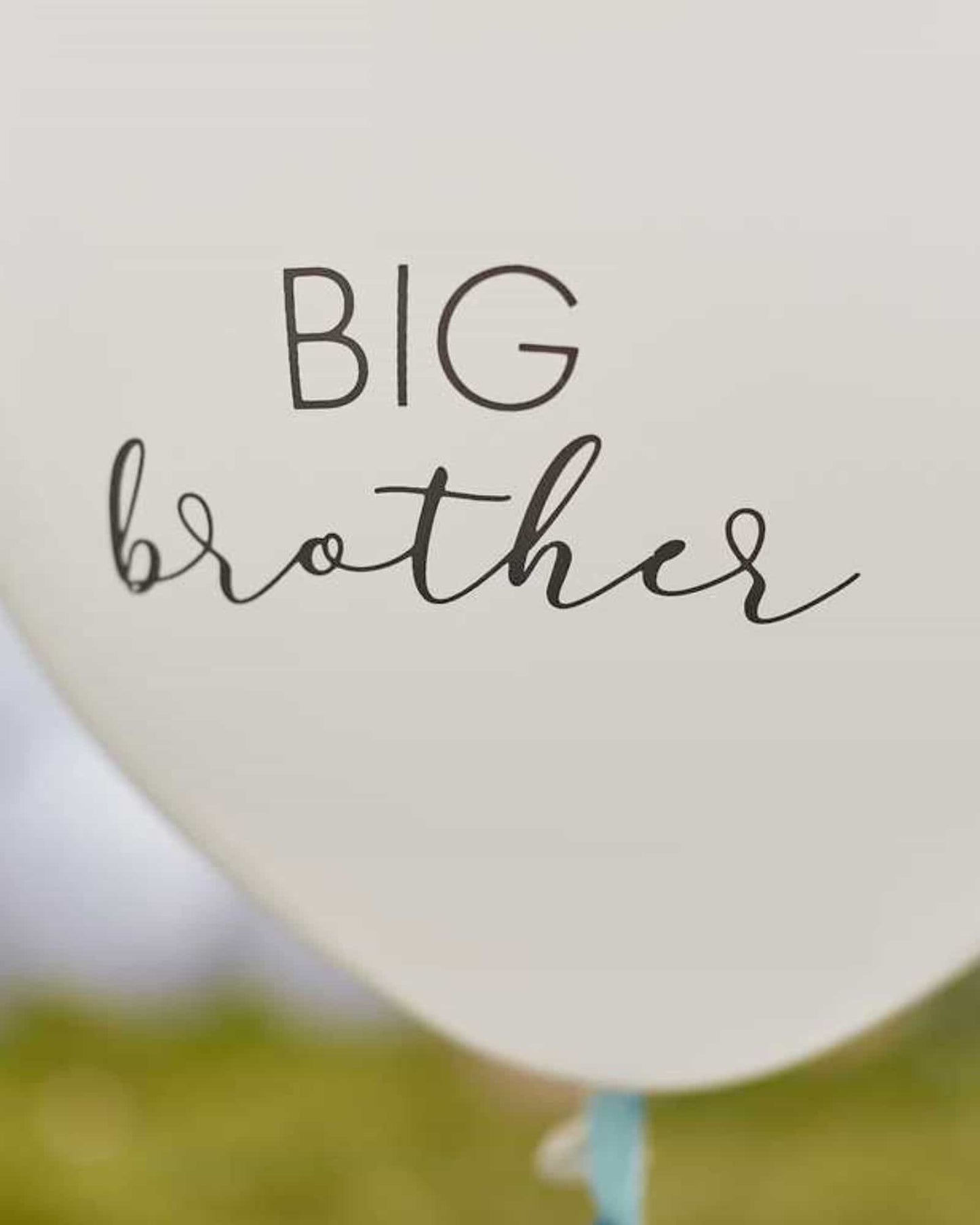 A white balloon displays the words "BIG brother" in elegant black lettering, accented with blue tassels.