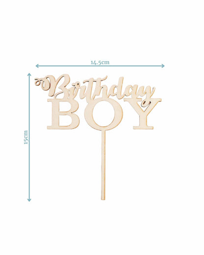 A wooden topper with "Birthday Boy" in playful lettering, measuring 14.5 cm wide and 15 cm tall.