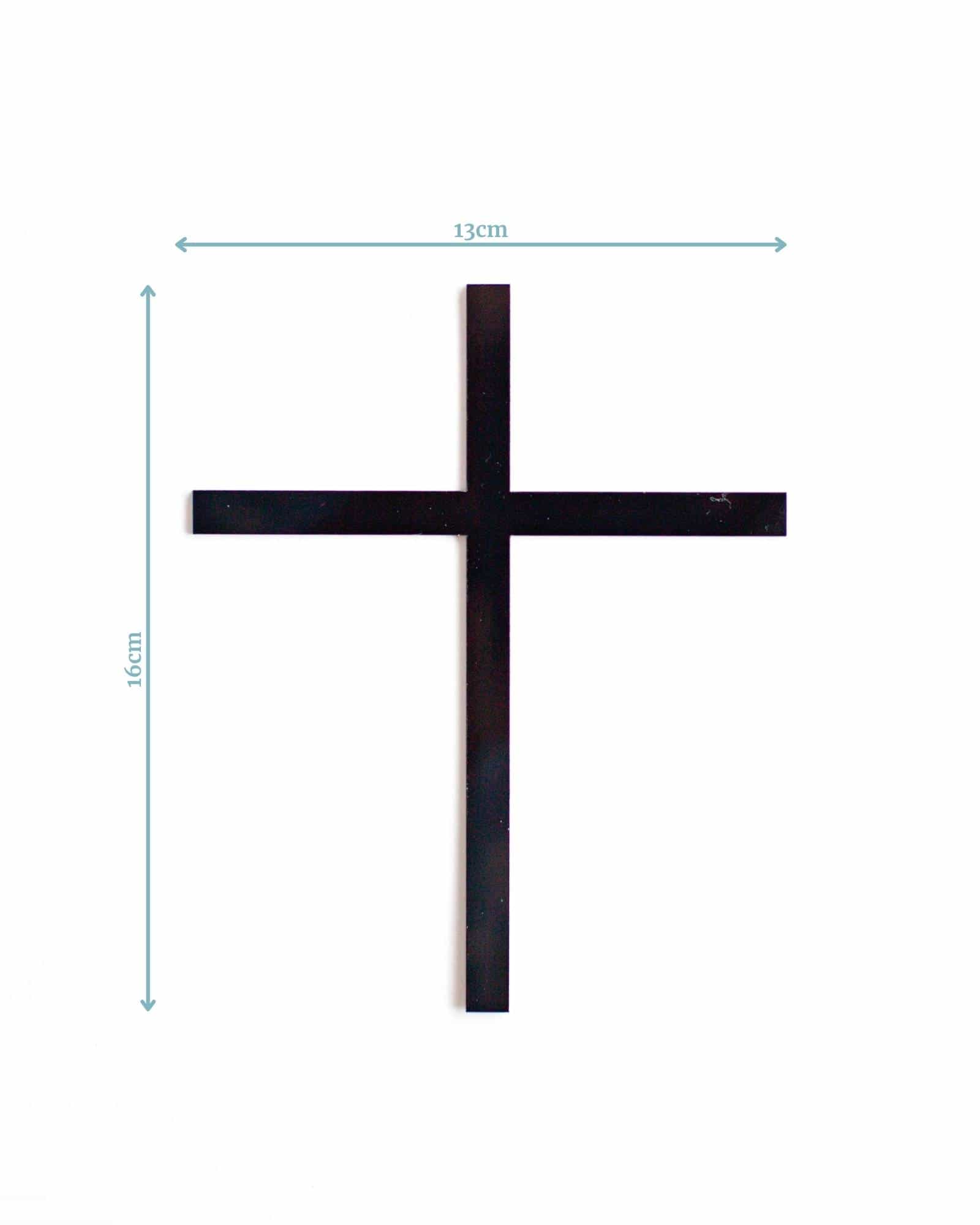 Black cross cake topper with dimensions 16cm tall and 13cm wide, set against a plain white background.