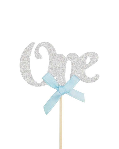 Silver "One" topper embellished with a light blue bow, perfect for celebrating a milestone.